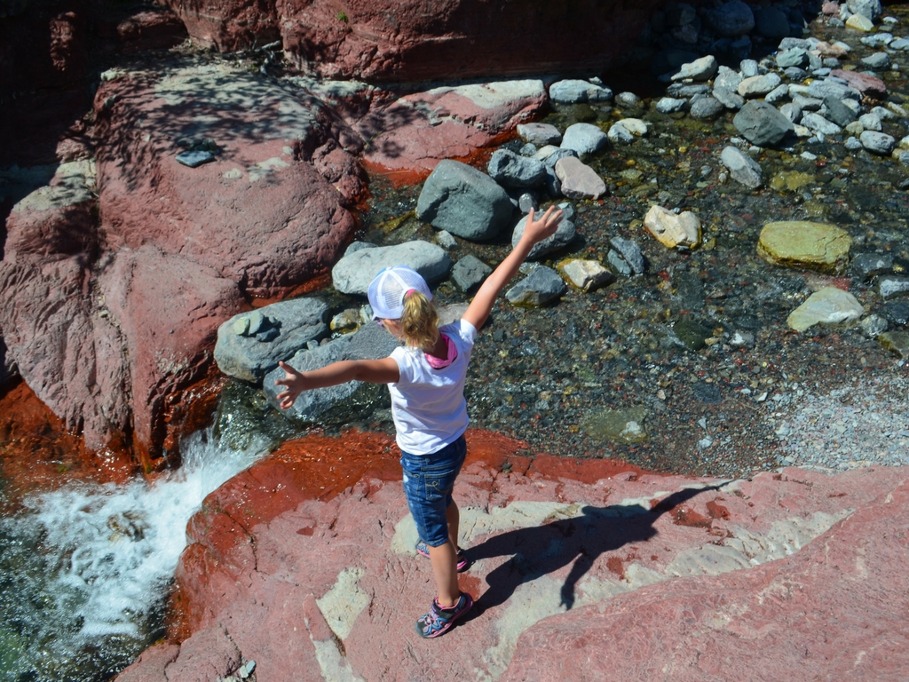 Girl at red rock canyon in Waterton Lakes National Park 