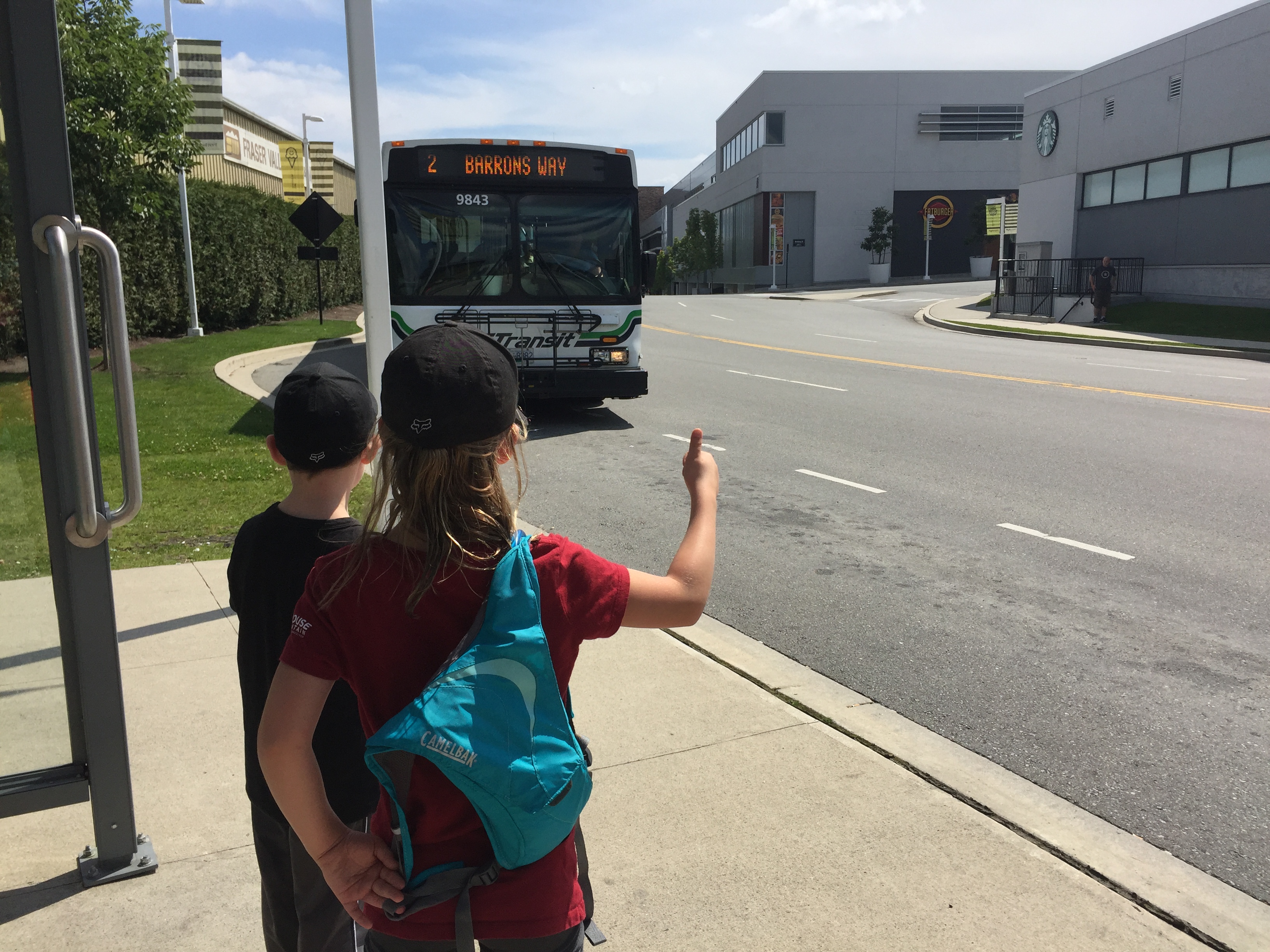 Children waiting at the Bus in Abbotsford for the explore bc by bus campaign