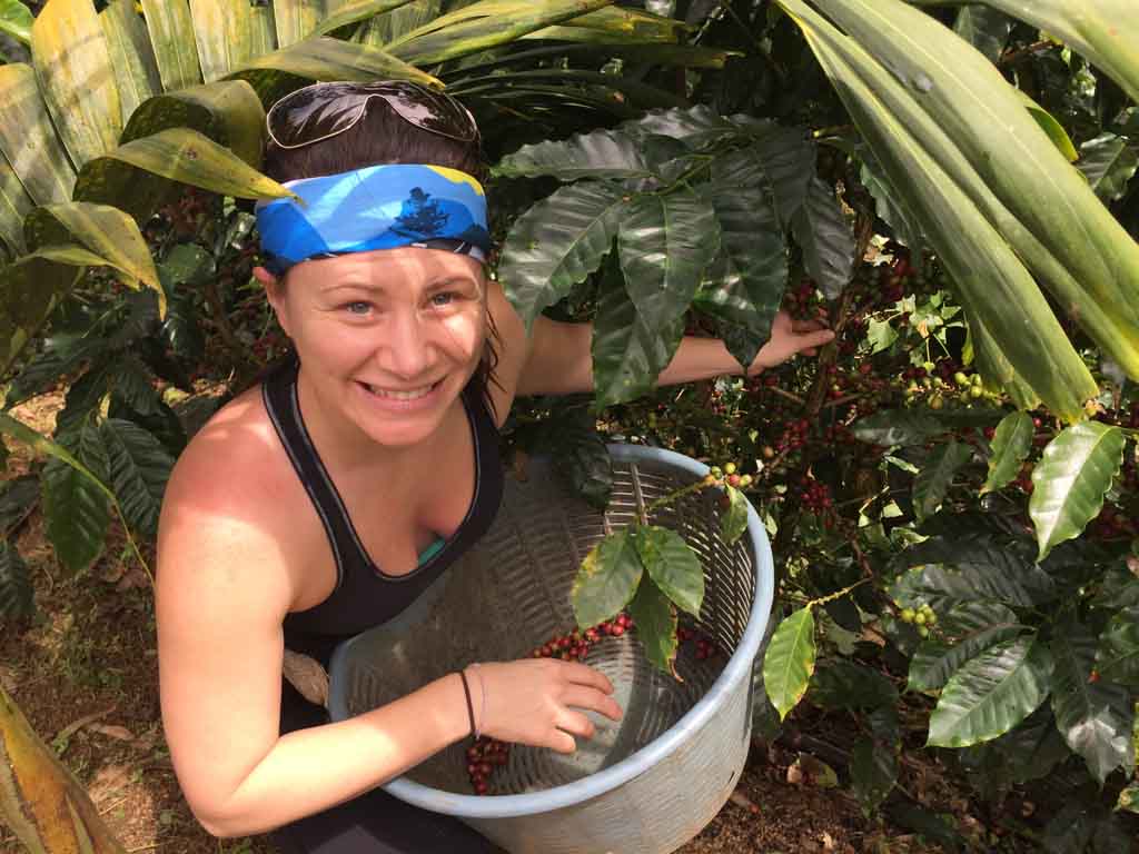 picking coffee beans at the Run Like a Girl Adventure and Wellness Retreat in Costa Rica