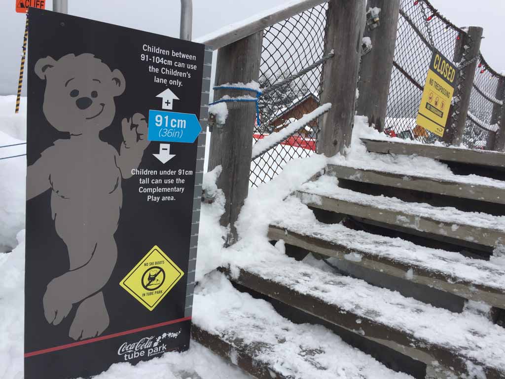 height requirement sign at whistler tube park