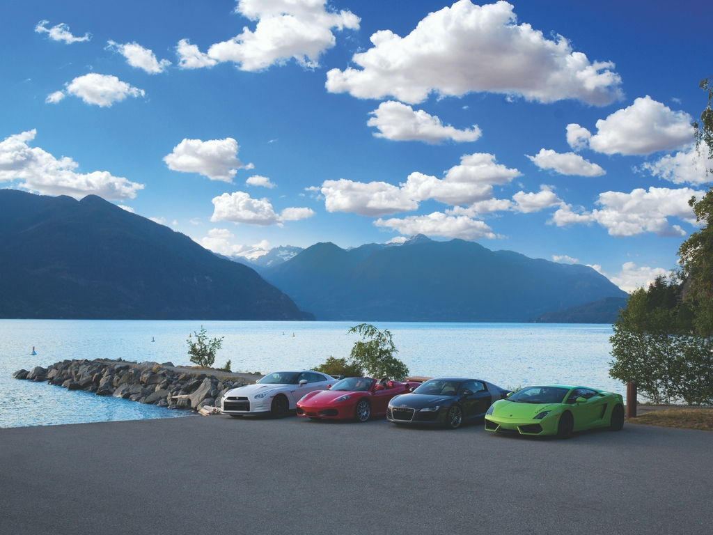 Luxury cars parked at Porteau Cove