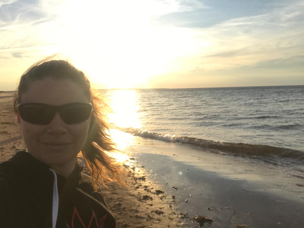 Jami Savage on the beach in the PEI National Park