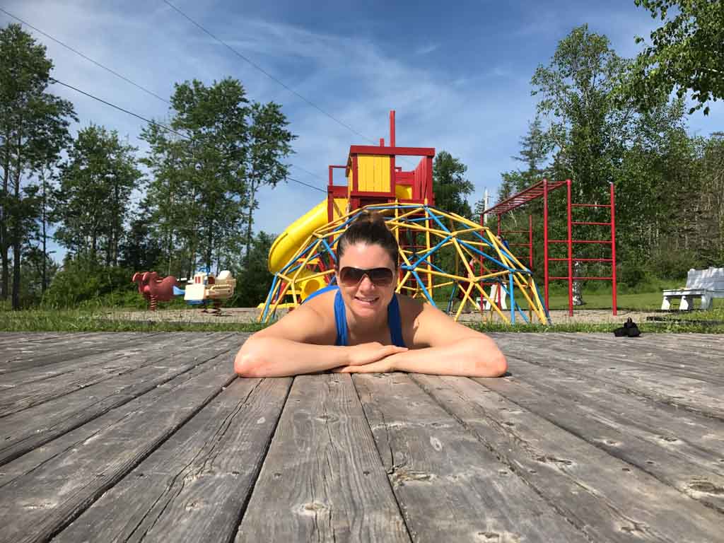 woman-lying-in-front-of-playground