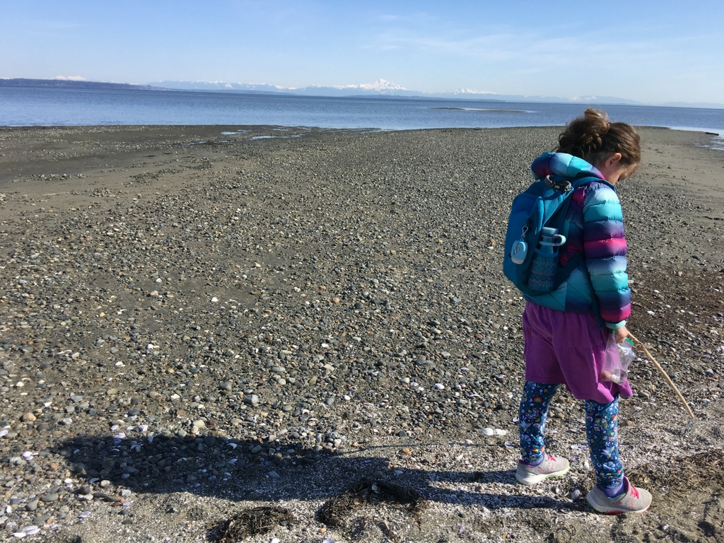 Girl walking on beach for Free Spring Break Activities in Vancouver 