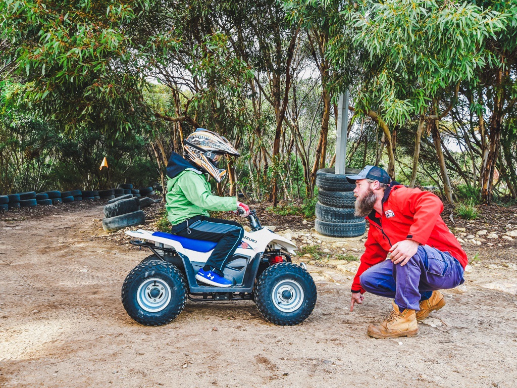 man teaching child to ride a quad at Kangaroo Island Outdoor Action 