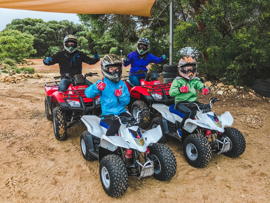 family riding quads on kangaroo island