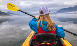 young girl kayaking on harrison lake