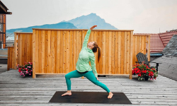woman doing yoga in banff