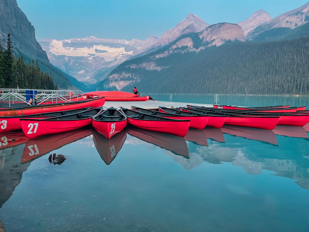 canoes lined up on lake louise